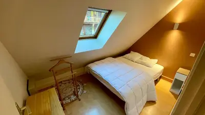 Un ou plusieurs lits dans un hébergement de l'établissement Le Joli Cèdre 8pers Le Mont Dore