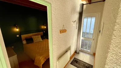 Un ou plusieurs lits dans un hébergement de l'établissement Le Joli Cèdre 8pers Le Mont Dore