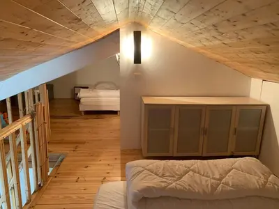 Un ou plusieurs lits dans un hébergement de l'établissement Gîte cocon Vassivière Aux abords du lac