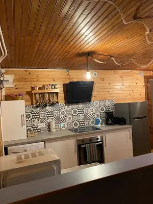 Cuisine ou kitchenette dans l'établissement Maison les papillons
