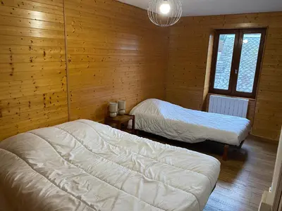 Un ou plusieurs lits dans un hébergement de l'établissement Maison les papillons