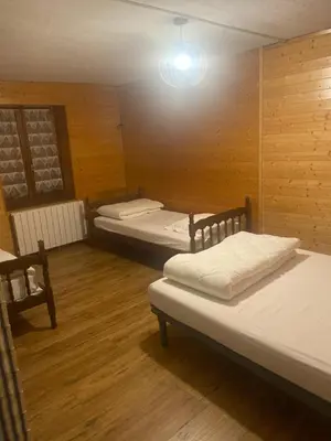 Un ou plusieurs lits dans un hébergement de l'établissement Maison les papillons