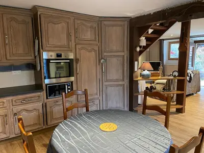 Cuisine ou kitchenette dans l'établissement La Libellule