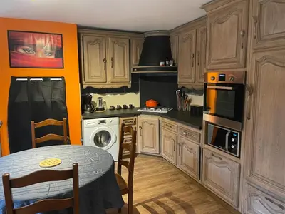 Cuisine ou kitchenette dans l'établissement La Libellule