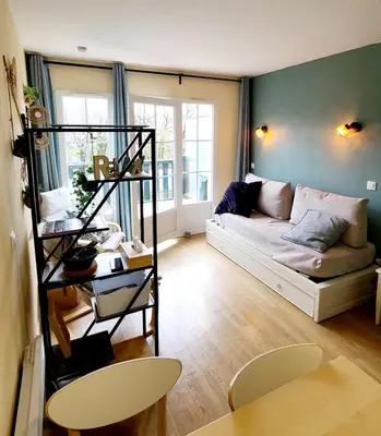 Coin salon dans l'établissement Charmant Duplex en bord de Dordogne - Argentat- Corrèze
