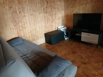 Télévision ou salle de divertissement dans l'établissement Gîte chez jeantou