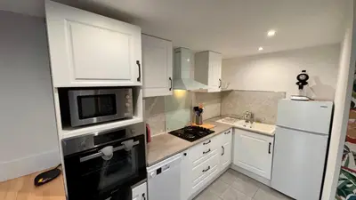 Cuisine ou kitchenette dans l'établissement Résidence Les Planchettes