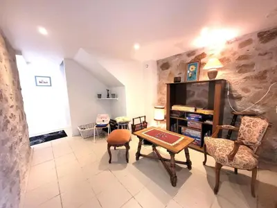Coin salon dans l'établissement Au fil de la Bontat Vézère