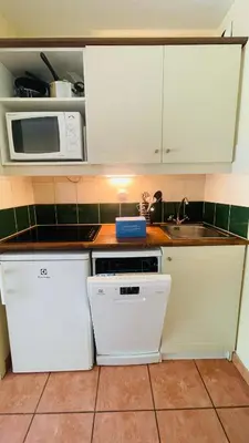 Cuisine ou kitchenette dans l'établissement Piscine chauffée vue sur la Dordogne
