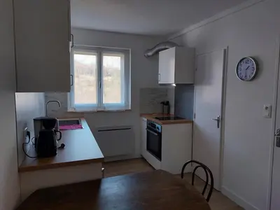 Cuisine ou kitchenette dans l'établissement Appartement en plein cœur du Massif du Sancy