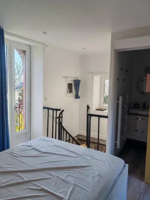 Un ou plusieurs lits dans un hébergement de l'établissement Gite a collonges la rouge avec spa