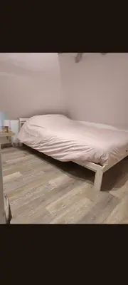 Un ou plusieurs lits dans un hébergement de l'établissement Gite a collonges la rouge avec spa