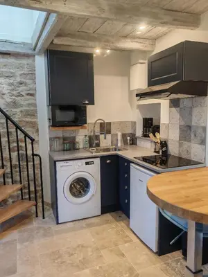 Cuisine ou kitchenette dans l'établissement Gite a collonges la rouge avec spa