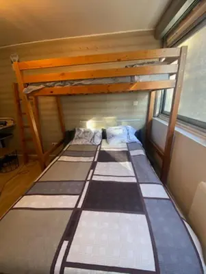 Un ou plusieurs lits dans un hébergement de l'établissement Studio en montagne