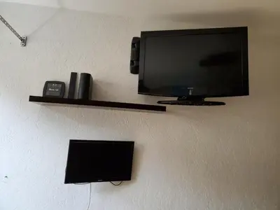 Télévision ou salle de divertissement dans l'établissement Studio en montagne