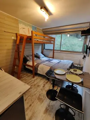 Un ou plusieurs lits dans un hébergement de l'établissement Super-Besse - studio 800m des pistes