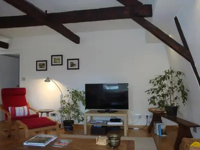 Télévision ou salle de divertissement dans l'établissement Beaulieu Apartments