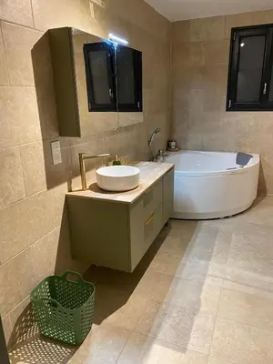 Salle de bains dans l'établissement Chez Nono et Nana