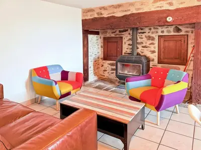 Coin salon dans l'établissement Gîte Mourniac cœur village - Corrèze - 3ch - 6pers