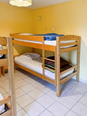 Un ou plusieurs lits dans un hébergement de l'établissement Gîte des Combes - Corrèze - 3ch - 10 pers