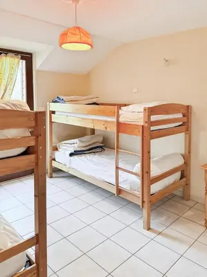 Un ou plusieurs lits dans un hébergement de l'établissement Gîte des Combes - Corrèze - 3ch - 10 pers