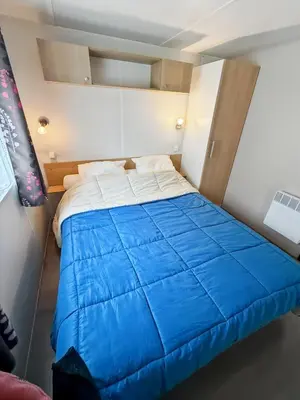 Un ou plusieurs lits dans un hébergement de l'établissement Mobil-home Le Sorbier, 6pers