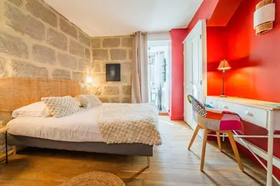 Un ou plusieurs lits dans un hébergement de l'établissement Escale de Dali - 1 Chambre