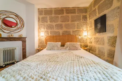 Un ou plusieurs lits dans un hébergement de l'établissement Escale de Dali - 1 Chambre