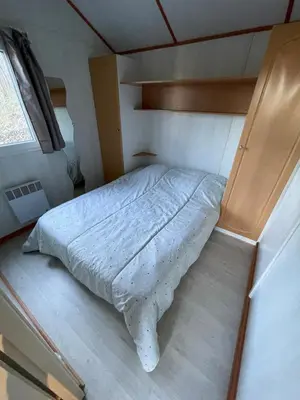 Un ou plusieurs lits dans un hébergement de l'établissement Chalet n 21