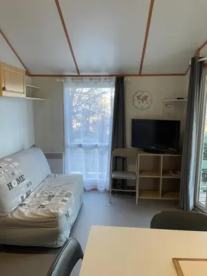 Télévision ou salle de divertissement dans l'établissement Chalet n 21