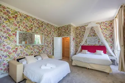 Un ou plusieurs lits dans un hébergement de l'établissement Domaine de Puy Robert LASCAUX - A 800m Grotte de Lascaux - Hôtel avec piscine - Chambres et gîtes-appartements - Sarlat - Dordogne