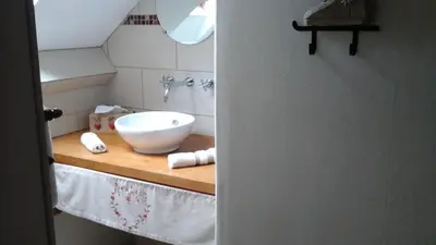 Salle de bains dans l'établissement La Freneraie