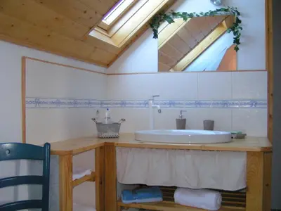 Salle de bains dans l'établissement La Freneraie