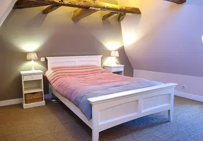 Un ou plusieurs lits dans un hébergement de l'établissement Maison Haute-Vue