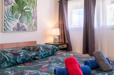 Un ou plusieurs lits dans un hébergement de l'établissement Le Petit Nid en Haut, en duplex