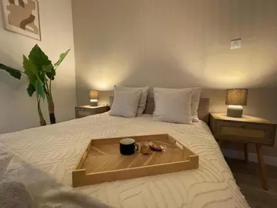 Un ou plusieurs lits dans un hébergement de l'établissement L 'Écrin Ivoire - Comfort and Productivity -Terrasse