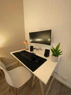 Télévision ou salle de divertissement dans l'établissement L 'Écrin Ivoire - Comfort and Productivity -Terrasse