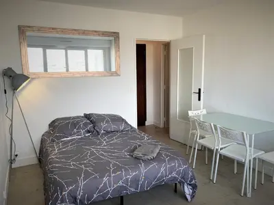 Un ou plusieurs lits dans un hébergement de l'établissement Appartement double à Limoges