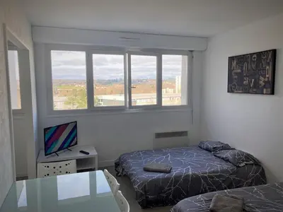 Un ou plusieurs lits dans un hébergement de l'établissement Appartement double à Limoges