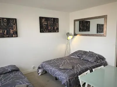 Un ou plusieurs lits dans un hébergement de l'établissement Appartement double à Limoges