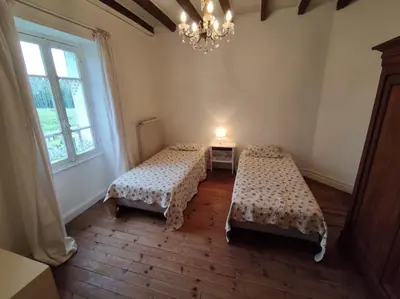 Un ou plusieurs lits dans un hébergement de l'établissement Alice's Home