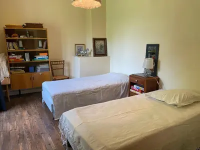 Un ou plusieurs lits dans un hébergement de l'établissement Alice's Home