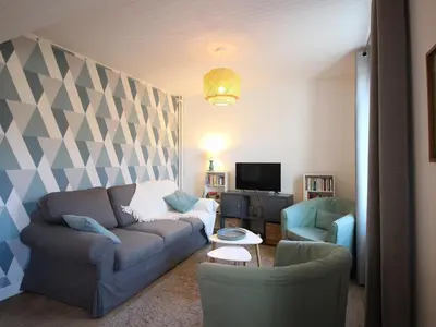Télévision ou salle de divertissement dans l'établissement Appart T3 lumineux, 5 pers, jardin, wifi, La Bourboule - FR-1-608-283