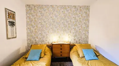 Coin salon dans l'établissement Gîte de France La maroussie 3 épis - Gîte de France 11 personnes MAE-5091