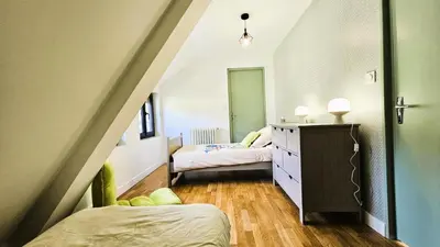 Un ou plusieurs lits dans un hébergement de l'établissement Gîte de France La maroussie 3 épis - Gîte de France 11 personnes MAE-5091