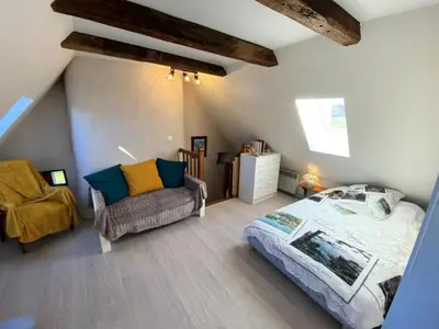 Un ou plusieurs lits dans un hébergement de l'établissement Gîte de France Le peuchois 2 épis - Gîte de France 2 personnes MAE-5181