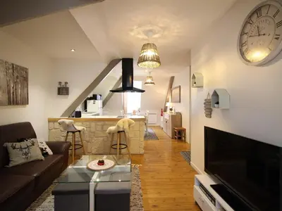 Coin salon dans l'établissement Spacieux T3 La Bourboule, 4 pers, proche thermes et commodités - FR-1-608-284