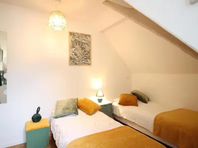 Un ou plusieurs lits dans un hébergement de l'établissement Spacieux T3 La Bourboule, 4 pers, proche thermes et commodités - FR-1-608-284