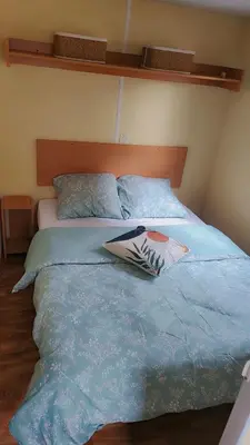 Un ou plusieurs lits dans un hébergement de l'établissement Mobile home