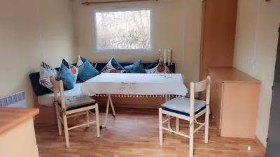 Coin salon dans l'établissement Mobile home